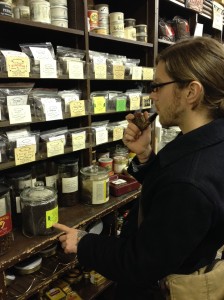 Cameron browsing the selection at one of his old favorite downtown Flint stops, Paul's Pipe Shop.